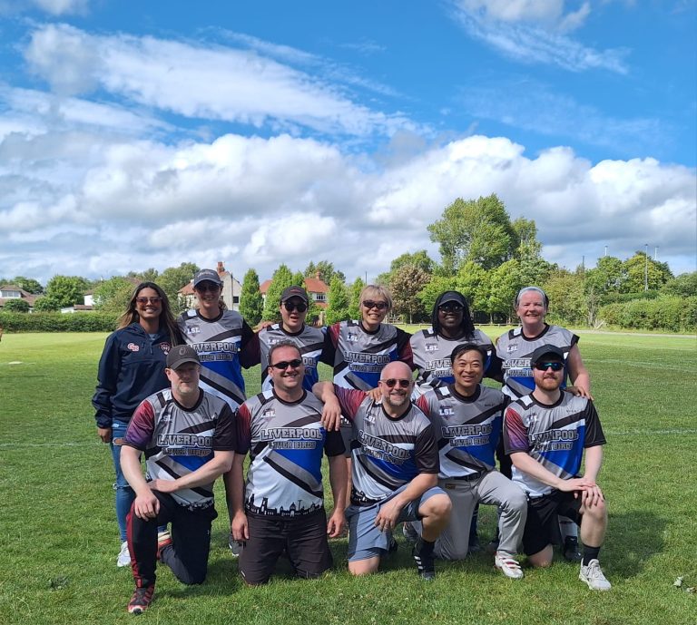 Liverbirds softball team group photo on field