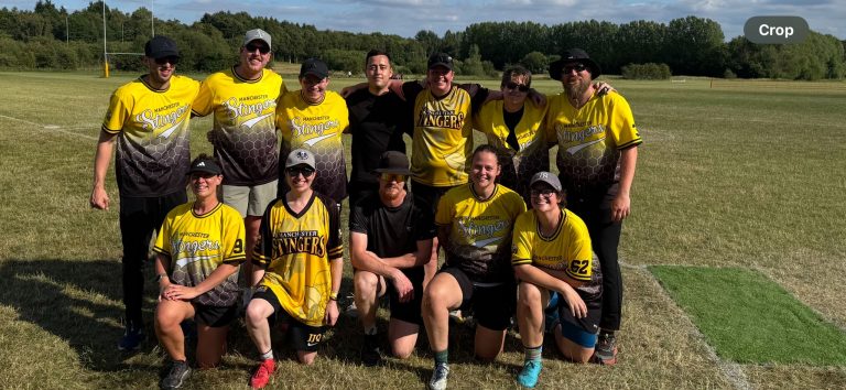 Stingers softball team in yellow kit group photo