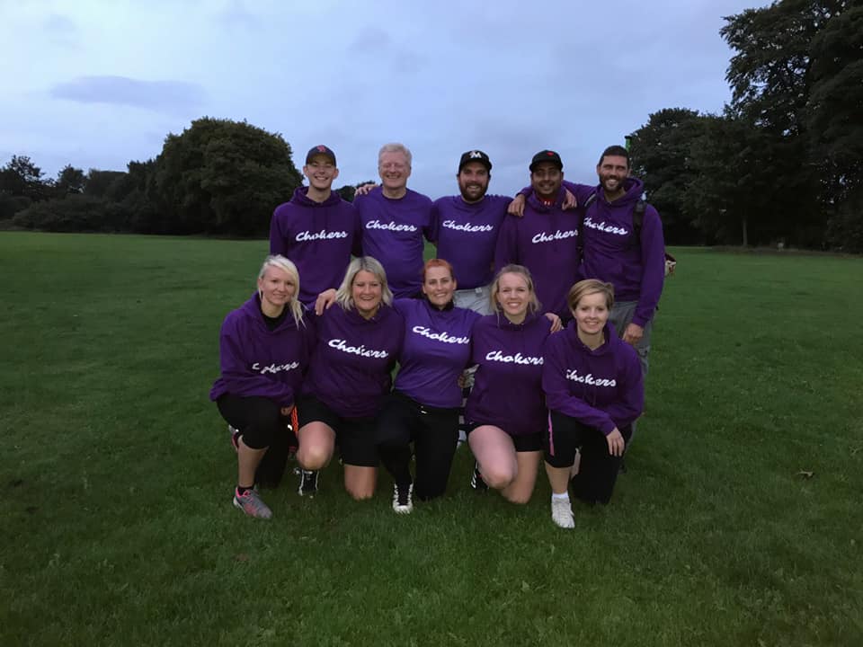Chokers softball team group photo in purple kit